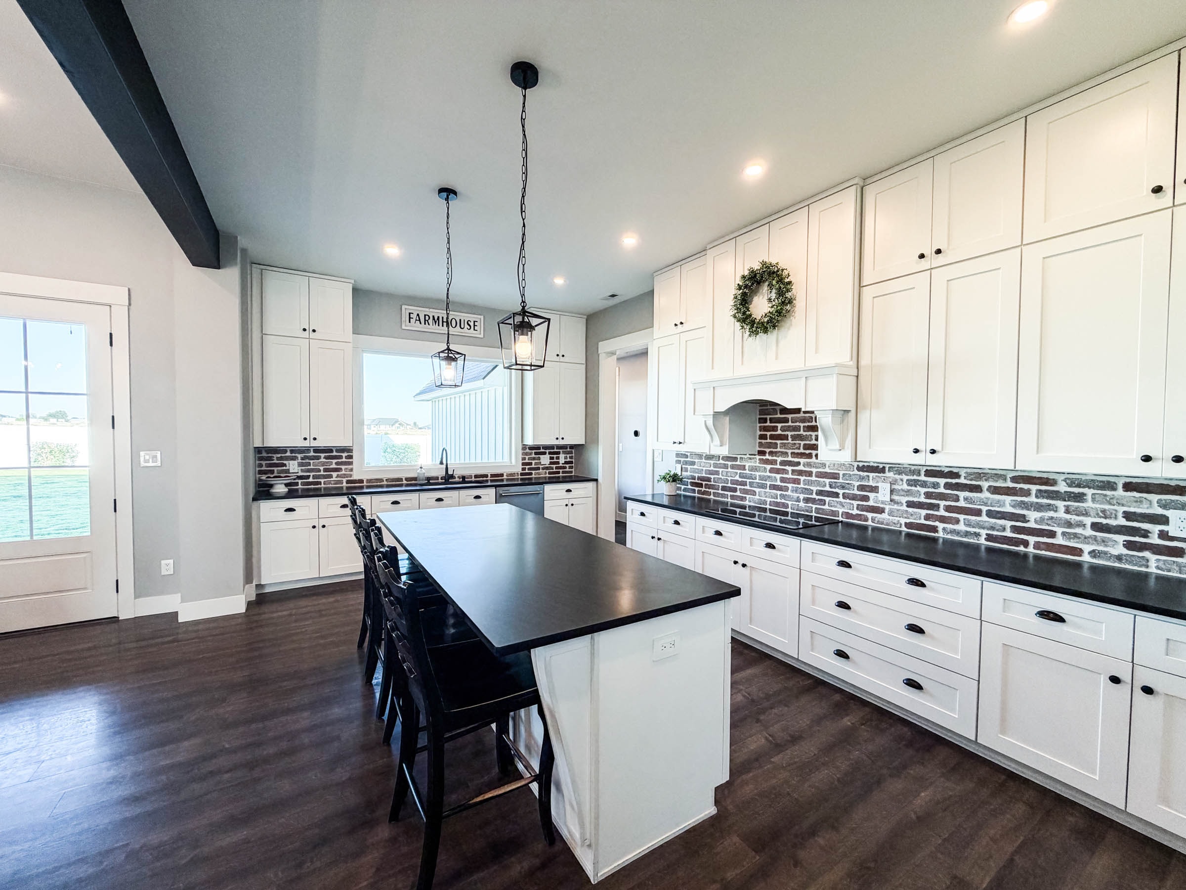 Kitchen wide view showing full layout and farmhouse details